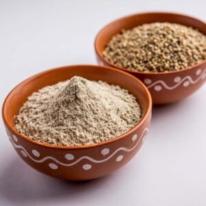 "Organic Pearl Millet Flour in a bowl with raw grains" "Freshly made Bajra rotis with chutney and vegetables" "Healthy baking using gluten-free Bajra Atta recipes"